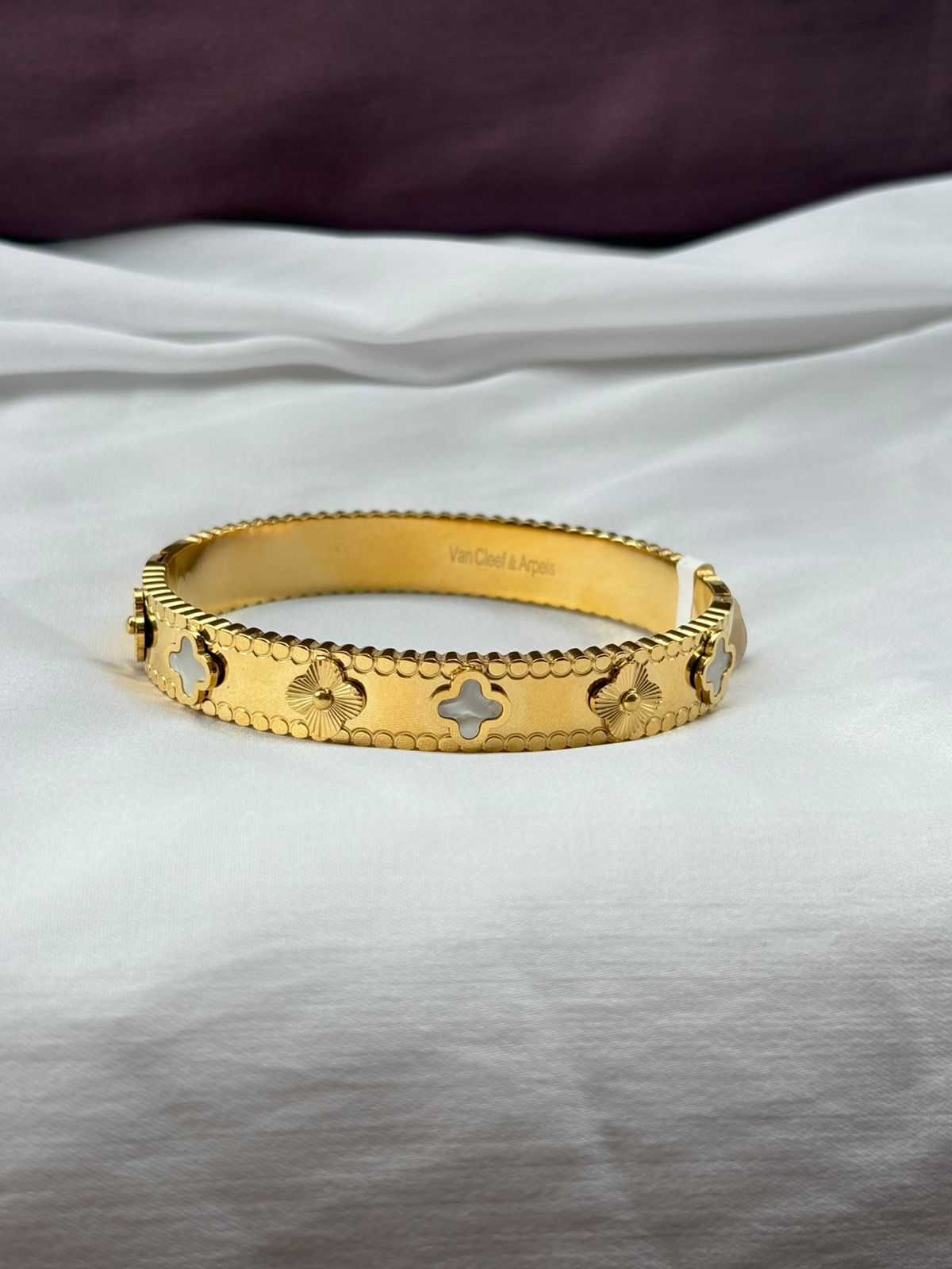 Elegant Crystal Embellished Clover Bangle