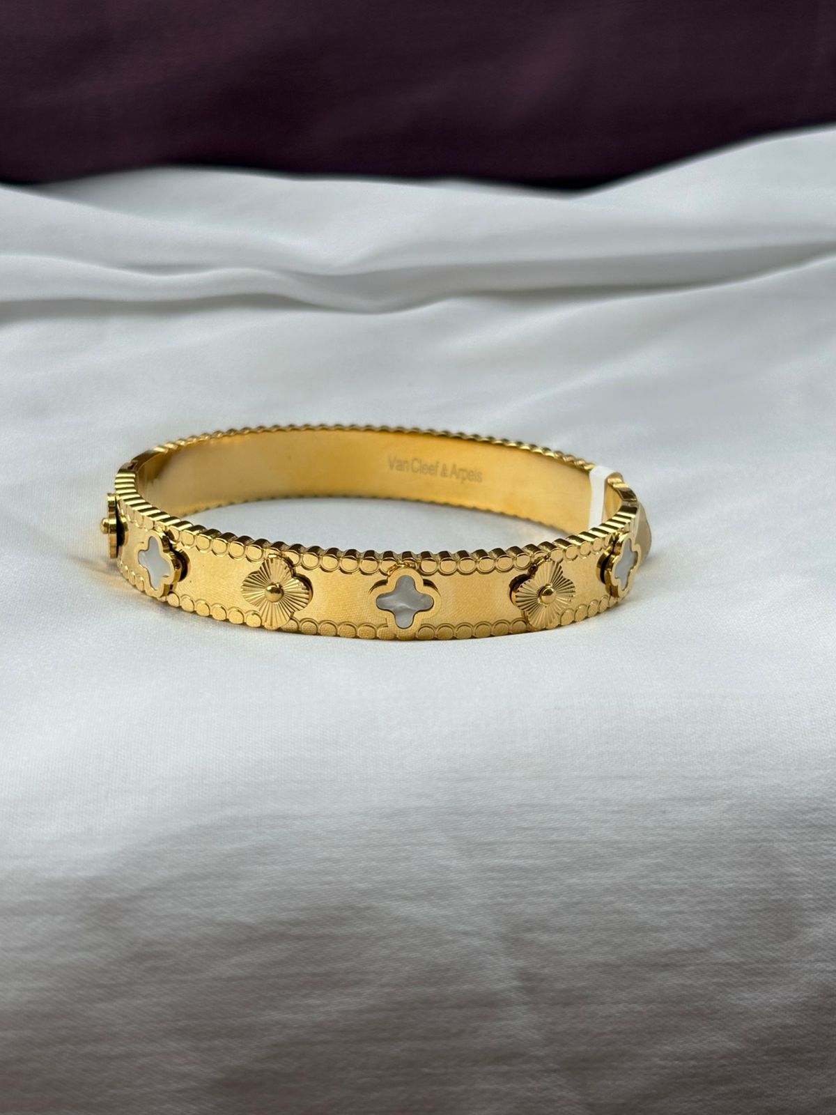 Elegant Crystal Embellished Clover Bangle