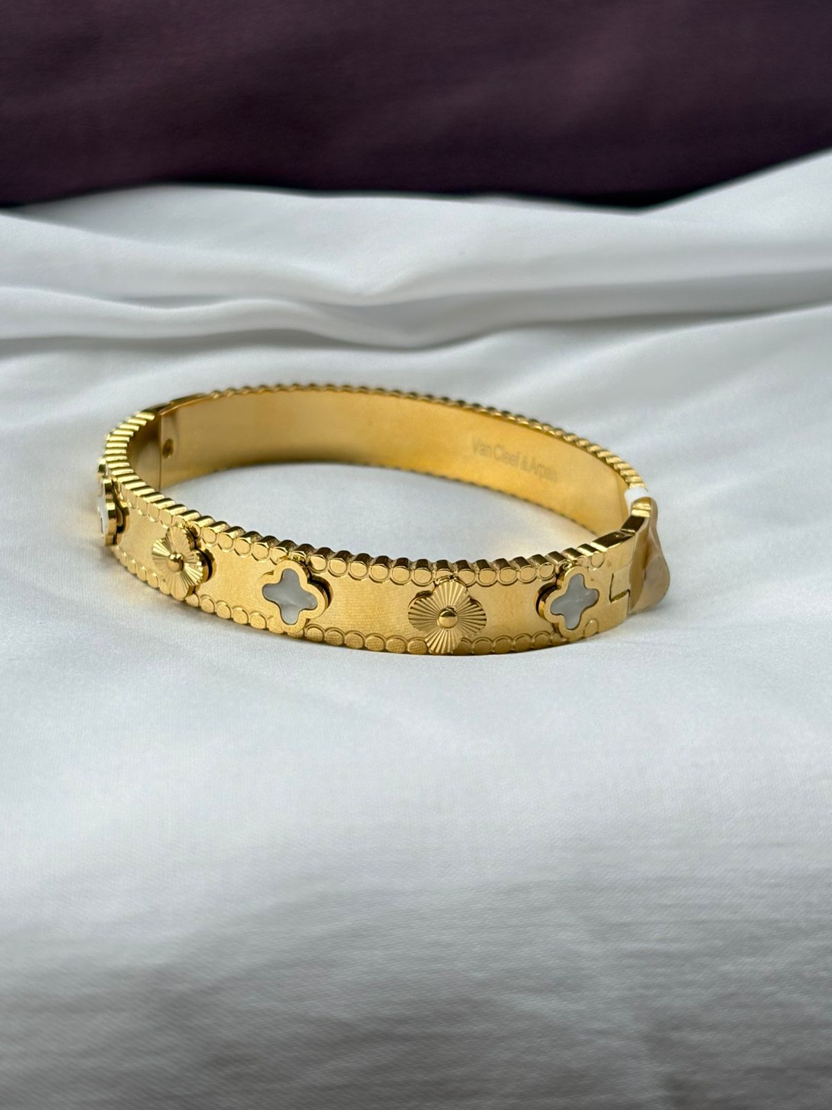 Elegant Crystal Embellished Clover Bangle