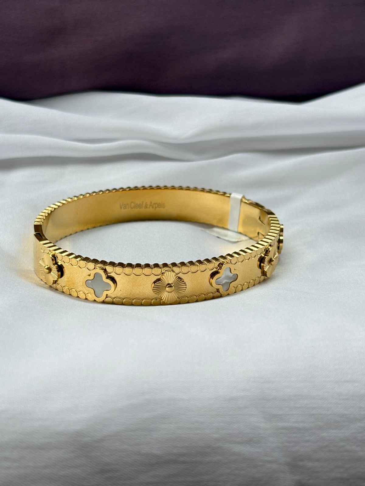Elegant Crystal Embellished Clover Bangle