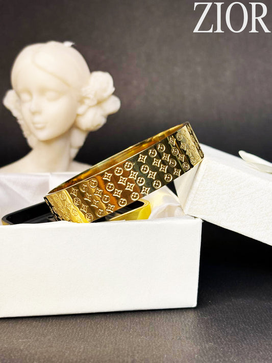 ZIOR Women's Gold-Plated Designer Bangle Bracelet Elegant Engraved Pattern