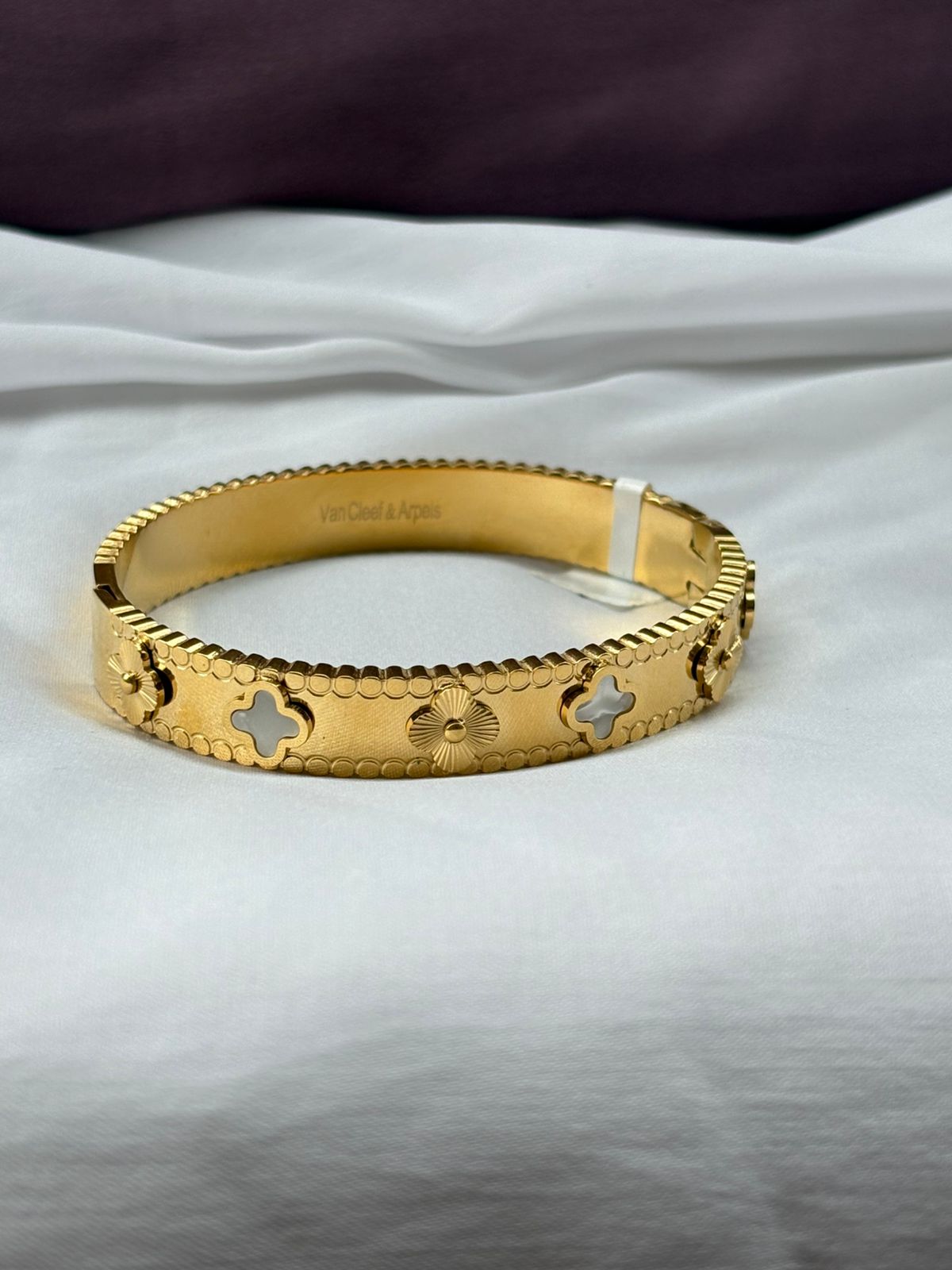 Elegant Crystal Embellished Clover Bangle